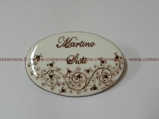 cod.art: nc63 - Mattonella in ceramica ovale 8,5x13 circa con "Moresco" e scritta personalizzata. 